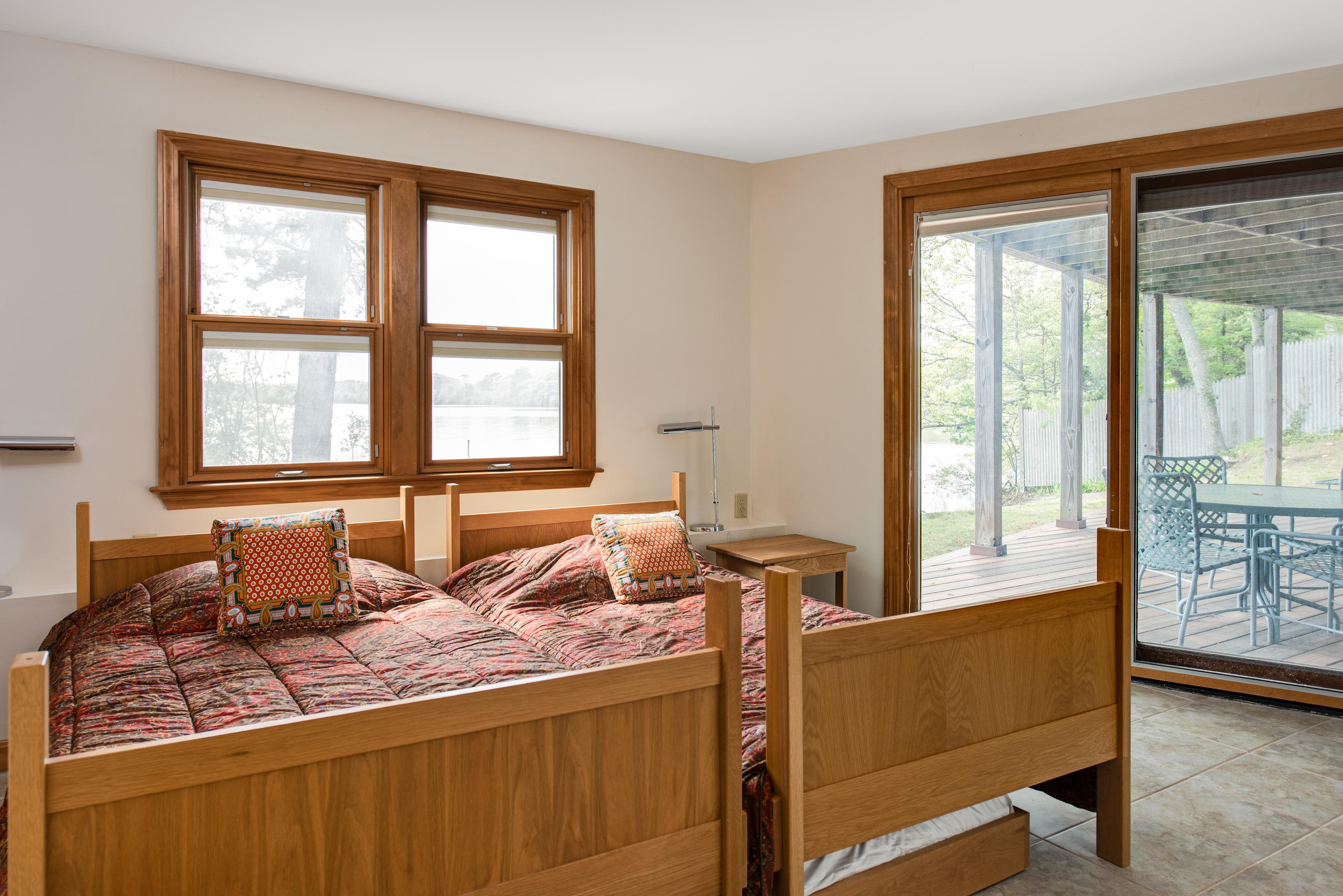 326 Holly Point Road Centerville, MA 02632 - Photo 15 of 30 a living room with furniture and large windows