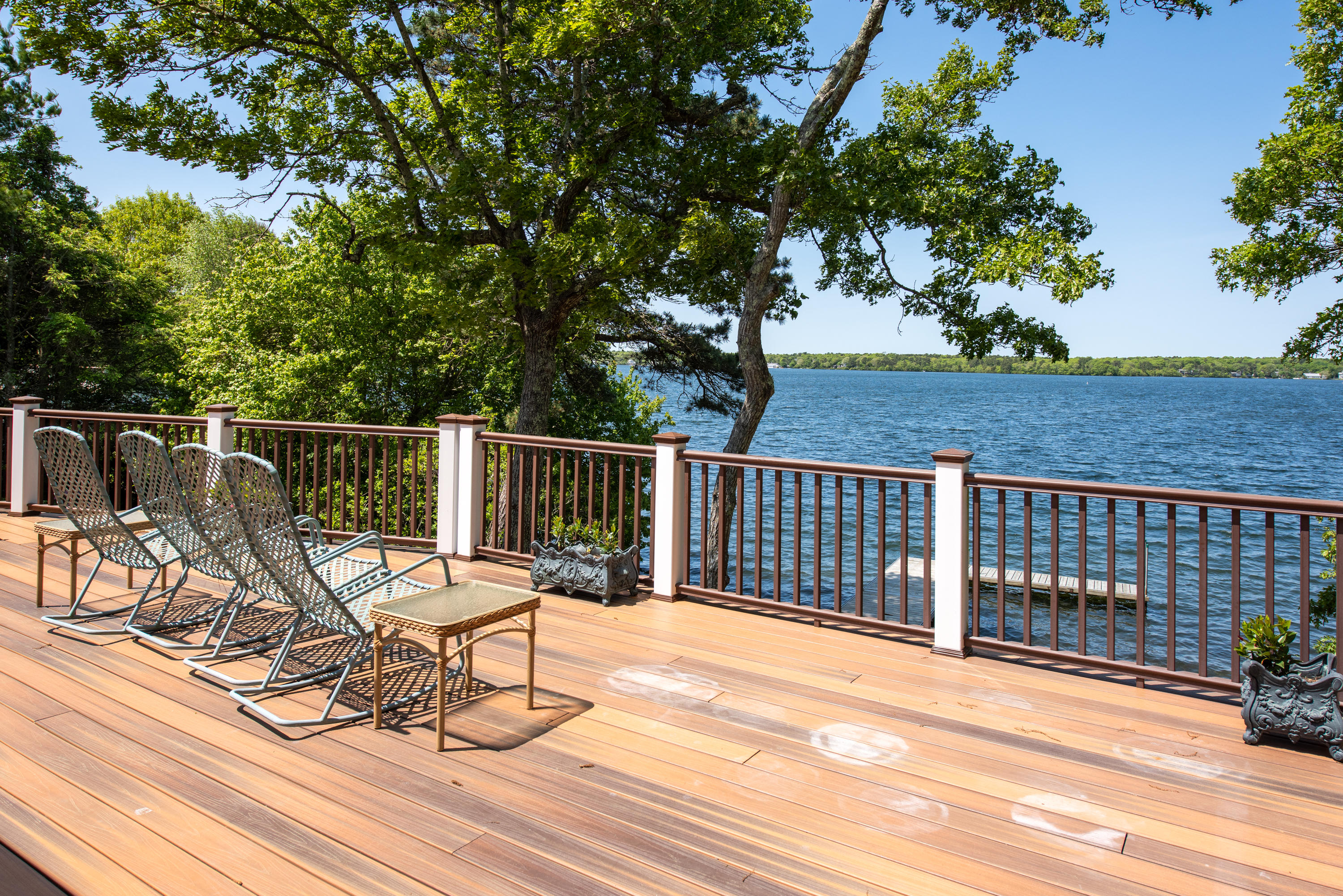 326 Holly Point Road Centerville, MA 02632 - Photo 17 of 30 a view of a chairs on wooden deck