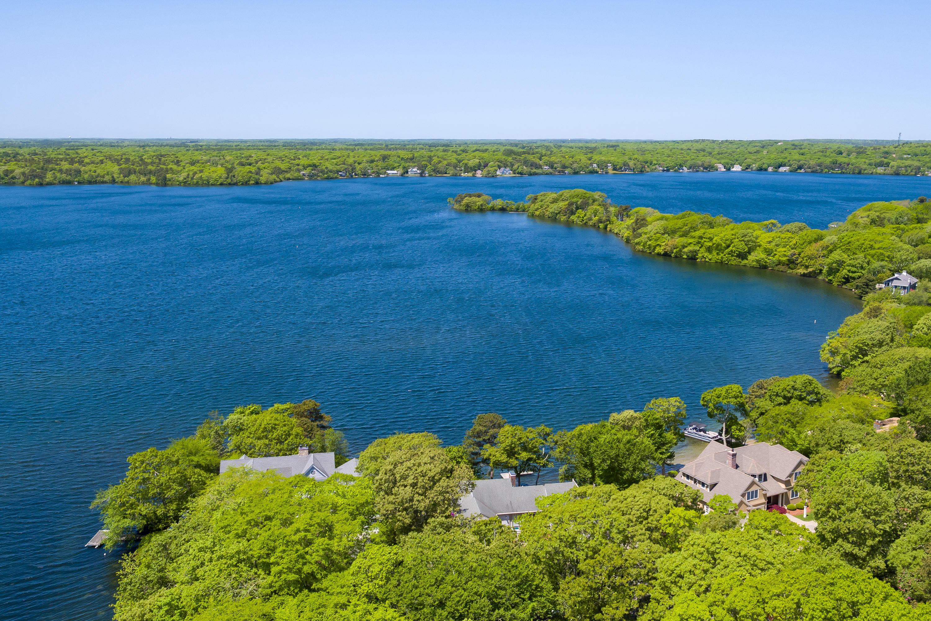 326 Holly Point Road Centerville, MA 02632 - Photo 25 of 30 a view of a lake with a mountain