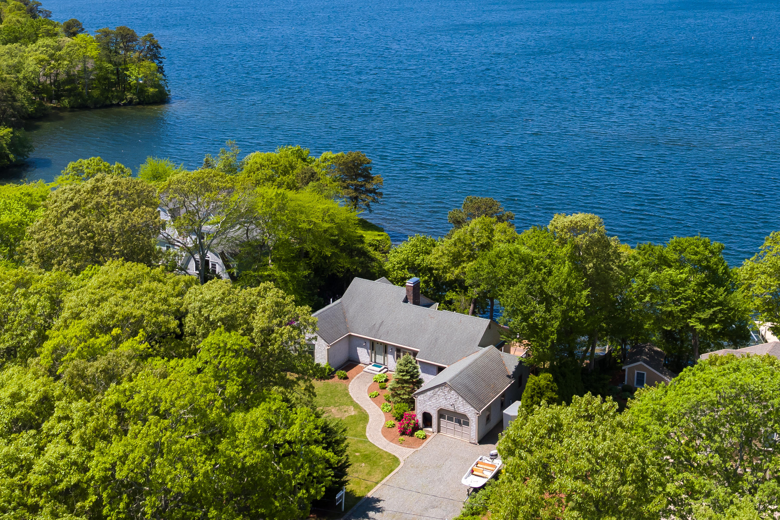 326 Holly Point Road Centerville, MA 02632 - Photo 27 of 30 an aerial view of a house with a lake view