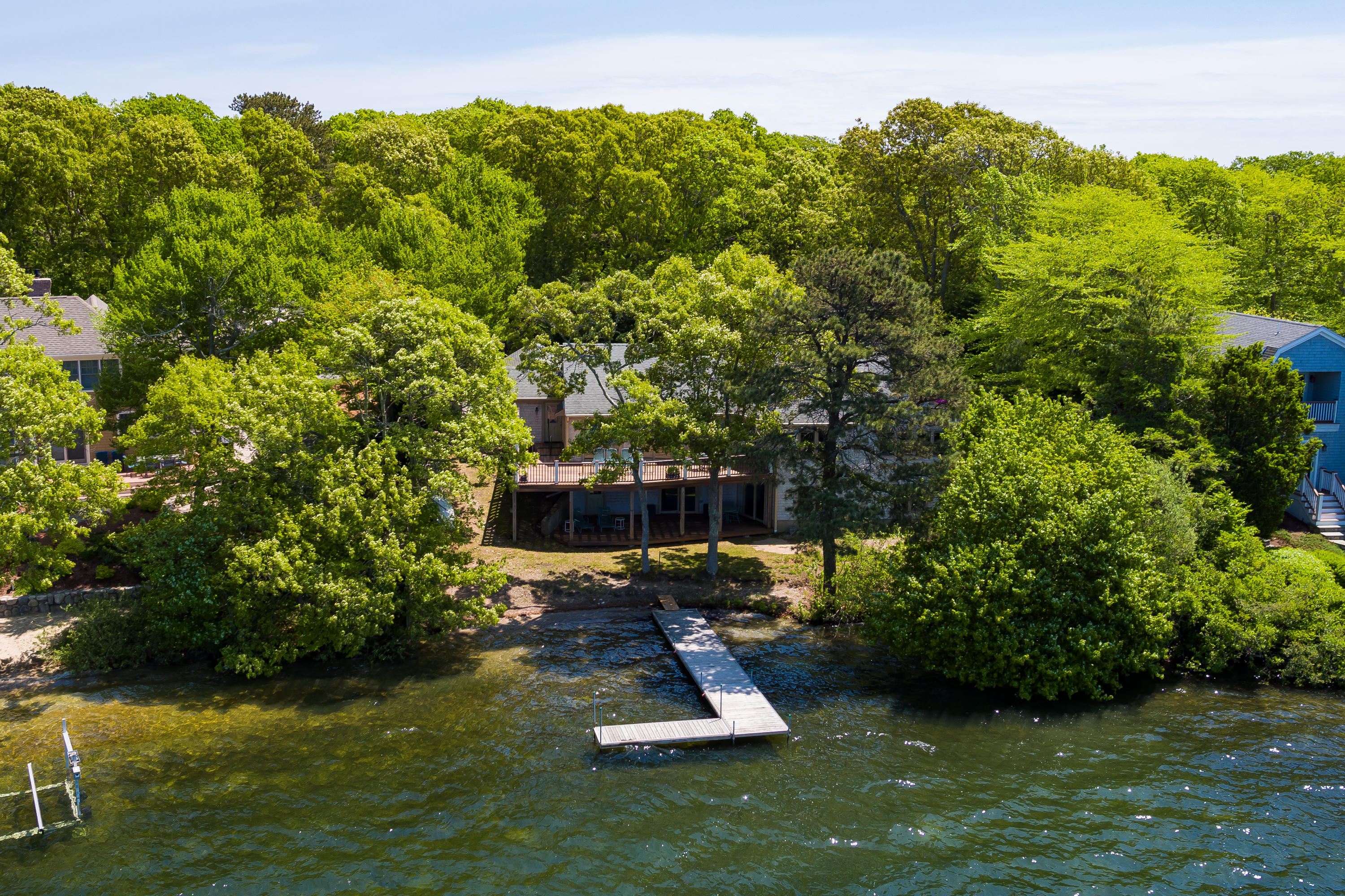 326 Holly Point Road Centerville, MA 02632 - Photo 28 of 30 a view of a swimming pool with a patio