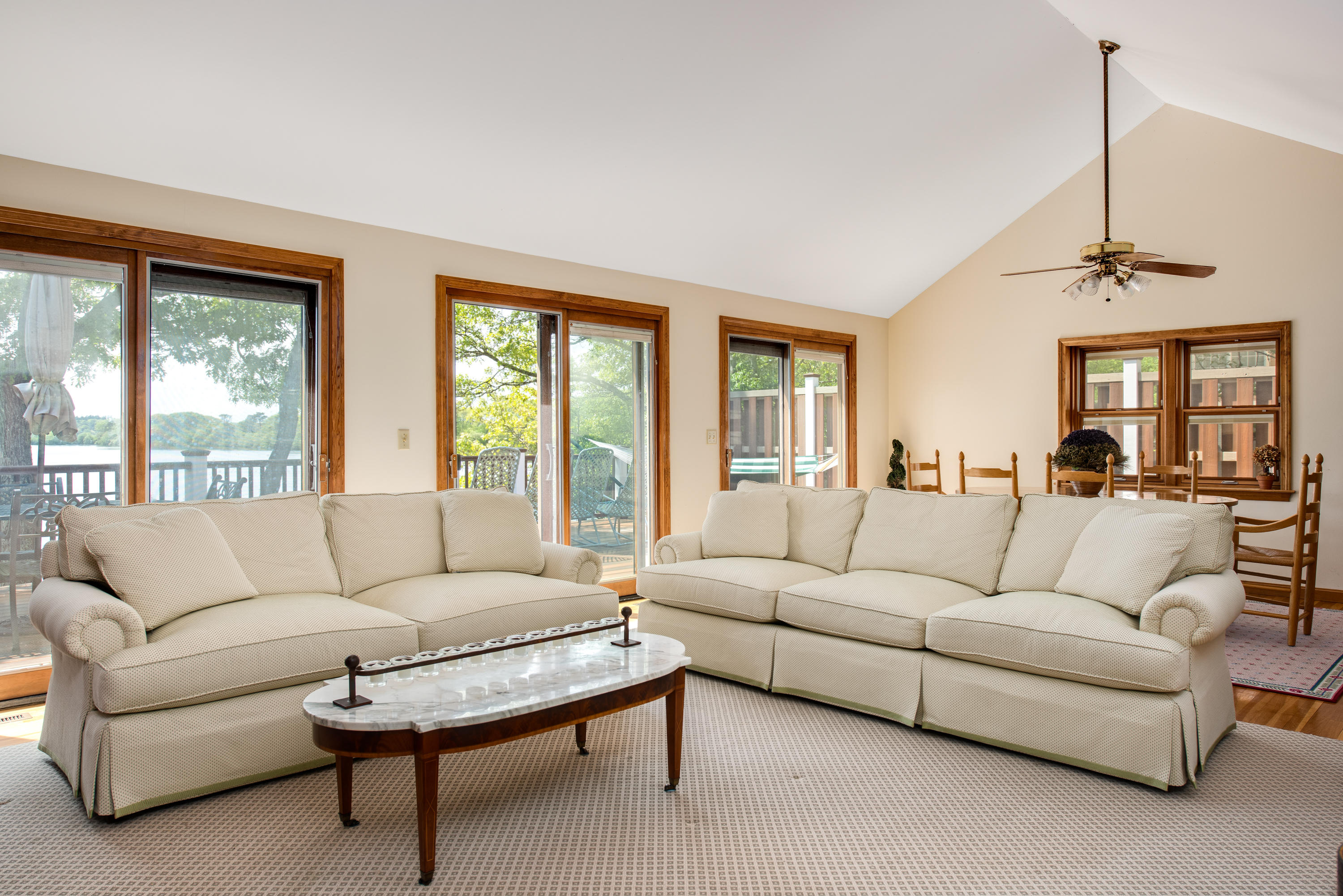 326 Holly Point Road Centerville, MA 02632 - Photo 8 of 30 a living room with furniture and a large window