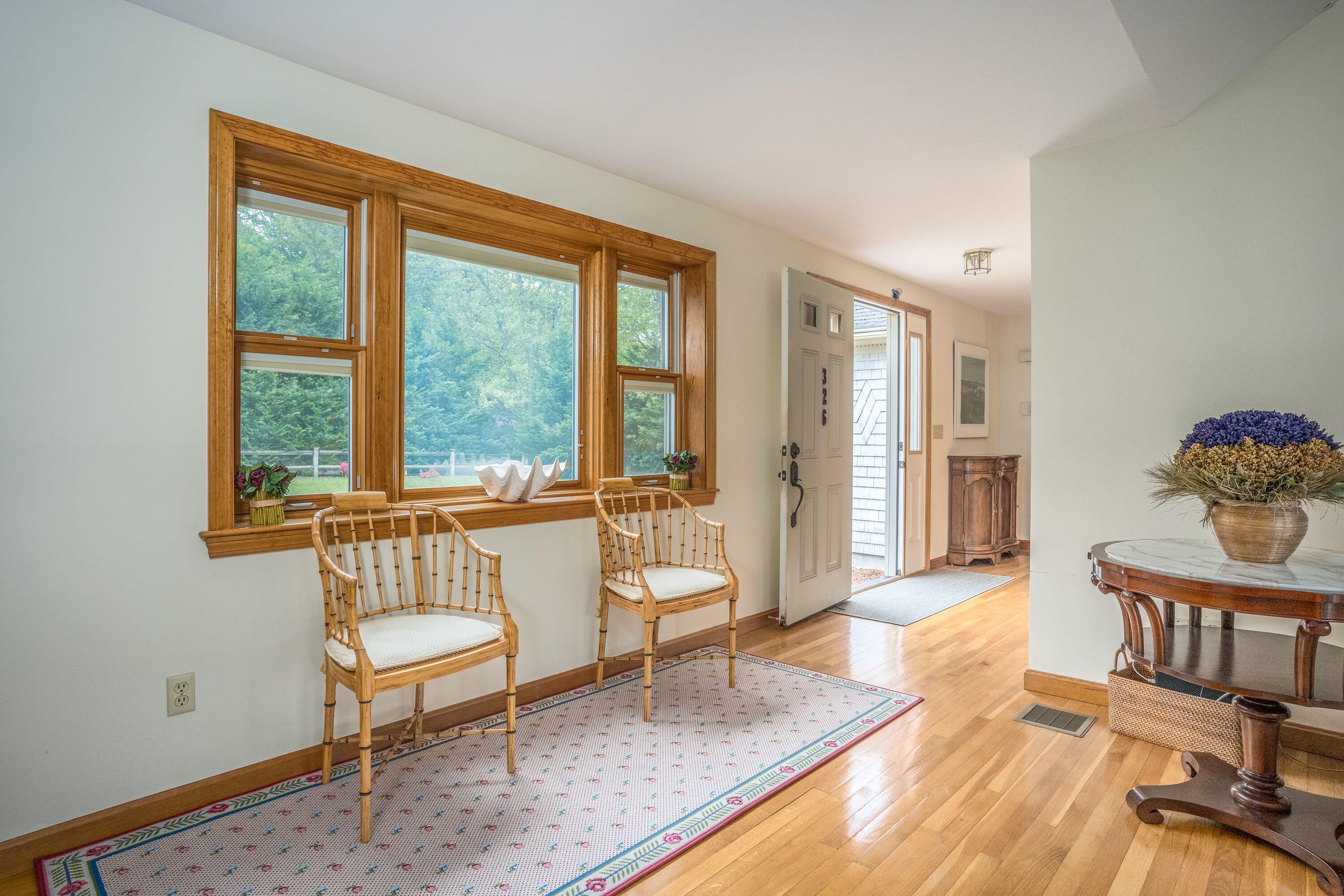 326 Holly Point Road Centerville, MA 02632 - Photo 10 of 30 a living room with furniture and a window