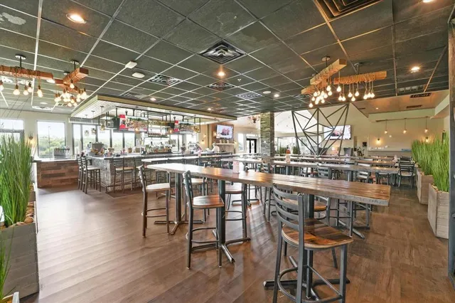 a view of a lake with a house in the background