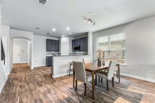 a kitchen with lots of counter space and a sink