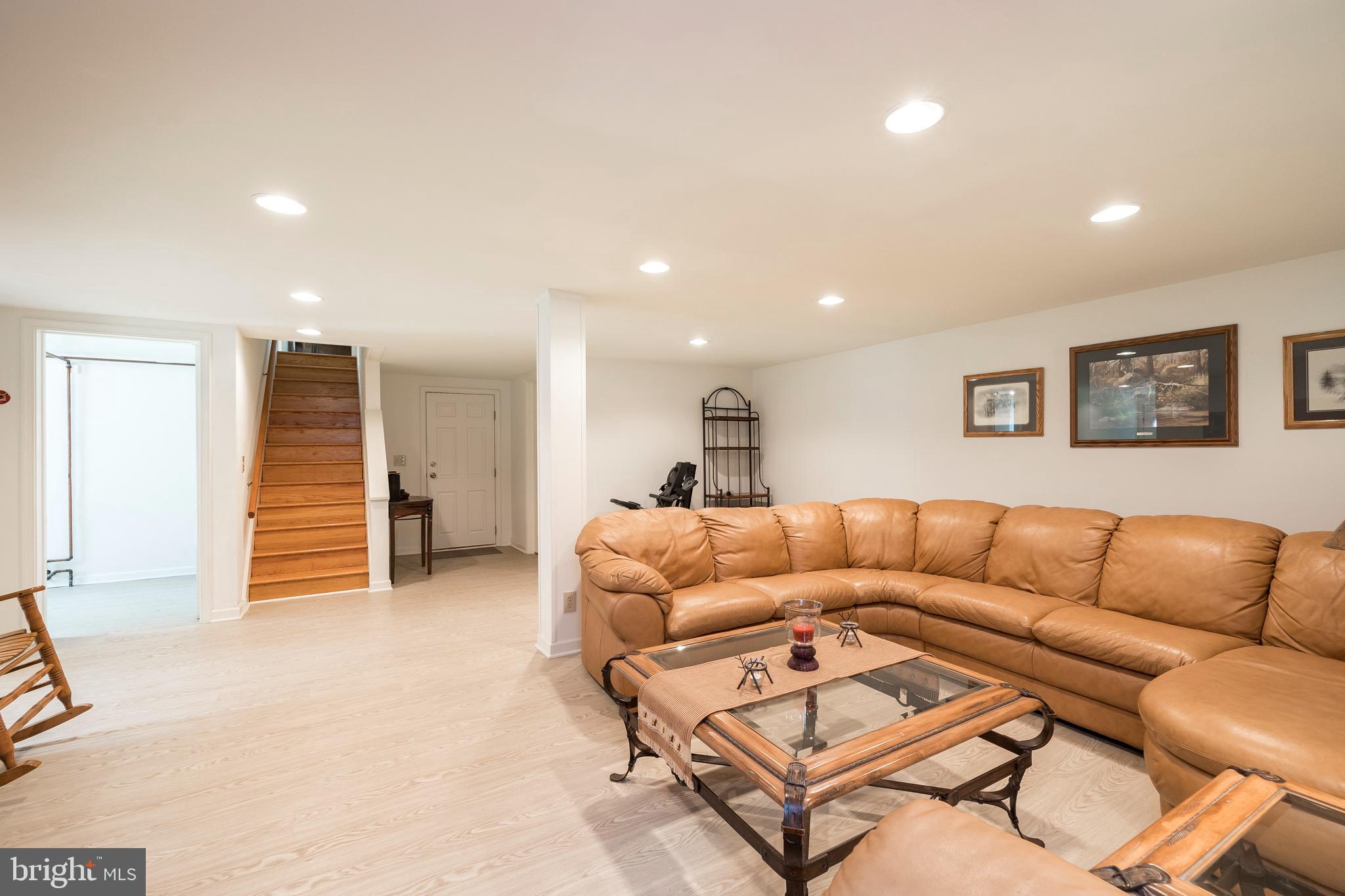 947 West Valley Road Pottstown, PA 19464 - Photo 24 of 36 Partially finished basement with new flooring