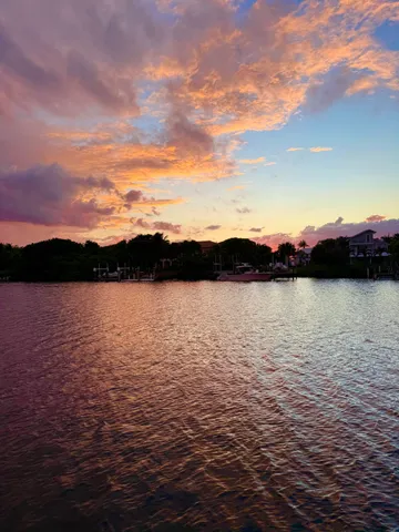 a view of lake and sunset