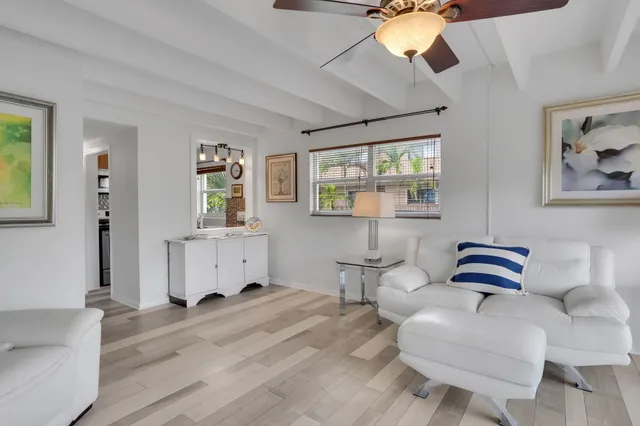 a bedroom with furniture and window