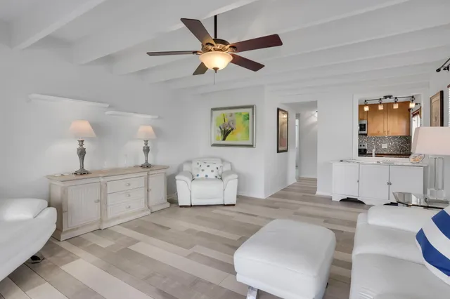 a living room with furniture and window