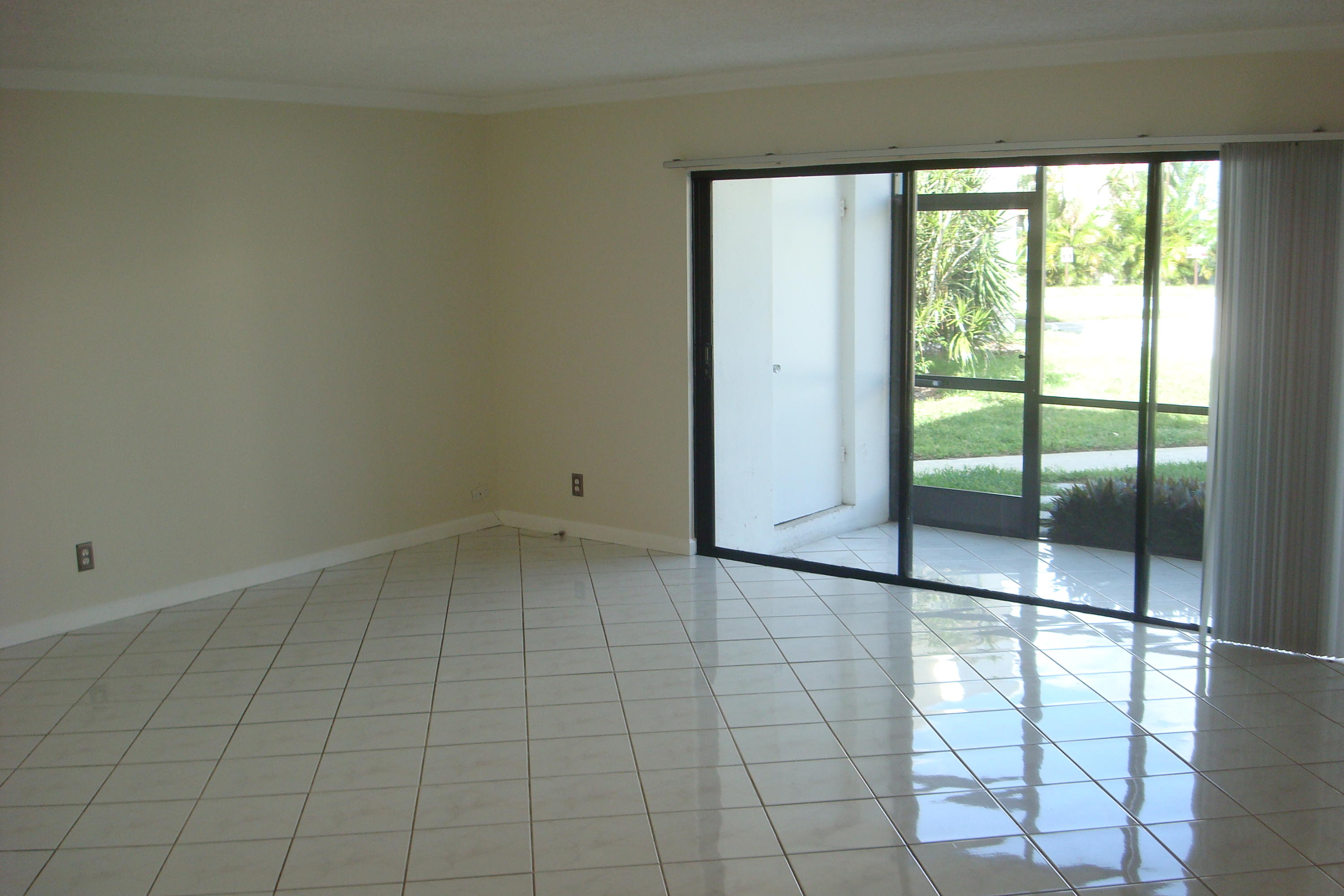 517 Dotterel Road, Unit 30A Delray Beach, FL 33444 - Photo 2 of 32 an empty room with windows