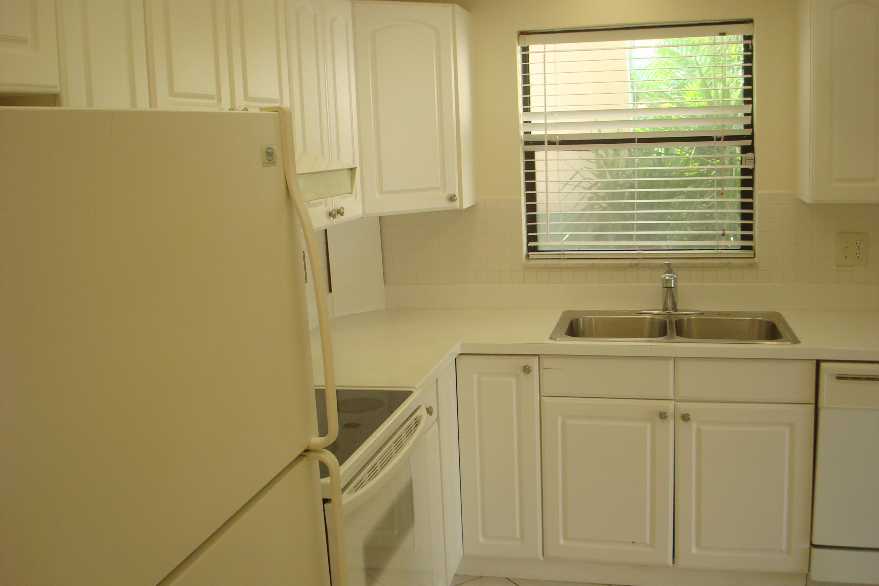 517 Dotterel Road, Unit 30A Delray Beach, FL 33444 - Photo 7 of 32 a bathroom with a sink and a vanity