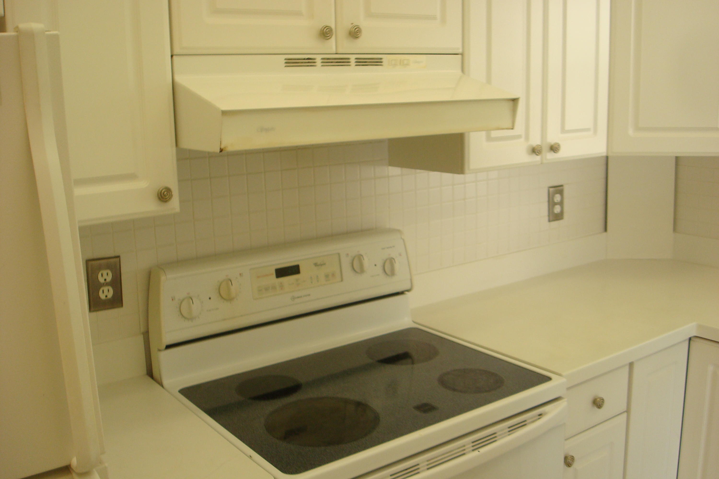 517 Dotterel Road, Unit 30A Delray Beach, FL 33444 - Photo 8 of 32 a bathroom with a sink and a washing machine