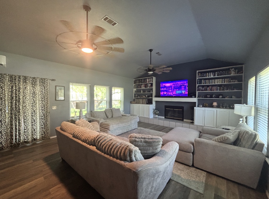 221 Winding Way Road Marble Falls, TX 78654 - Photo 3 of 19 a living room with furniture and a floor to ceiling window