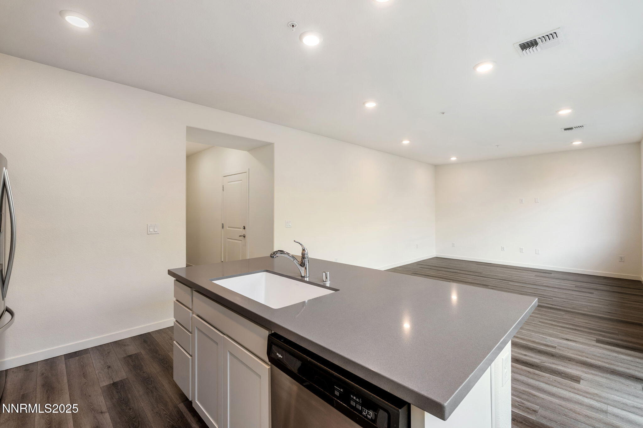 4589 Falcon Rock Lane Sun Valley, NV 89433 - Photo 10 of 26 a view of a bathroom with sink and mirror