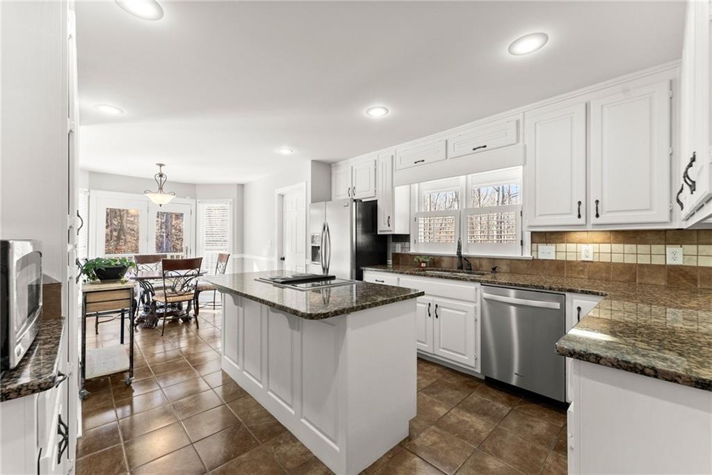 3523 Lighthouse Lane Gainesville, GA 30504 - Photo 16 of 72 a kitchen with lots of counter top space and furniture