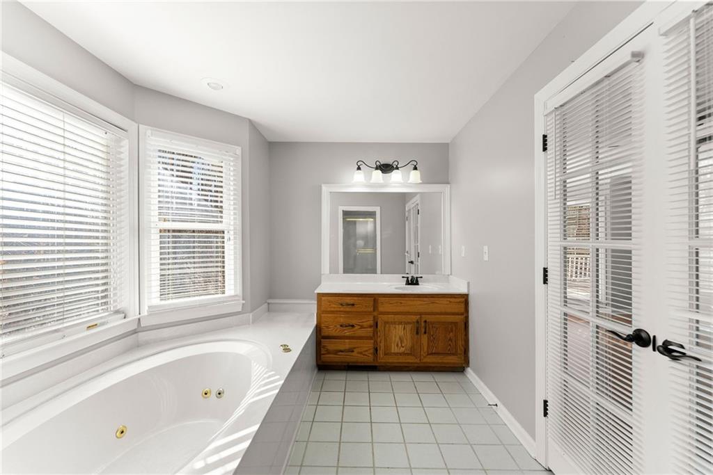 3523 Lighthouse Lane Gainesville, GA 30504 - Photo 26 of 72 a bathroom with a bathtub and a sink