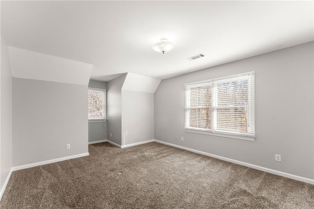 3523 Lighthouse Lane Gainesville, GA 30504 - Photo 34 of 72 an empty room with windows