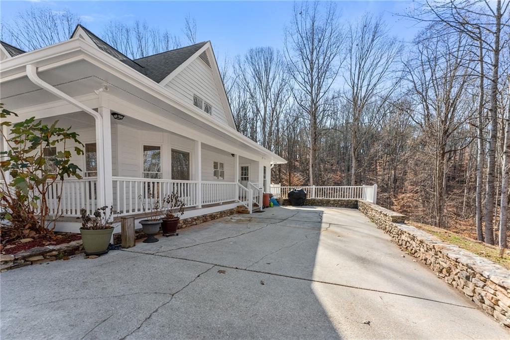 3523 Lighthouse Lane Gainesville, GA 30504 - Photo 5 of 72 a view of a house with a patio