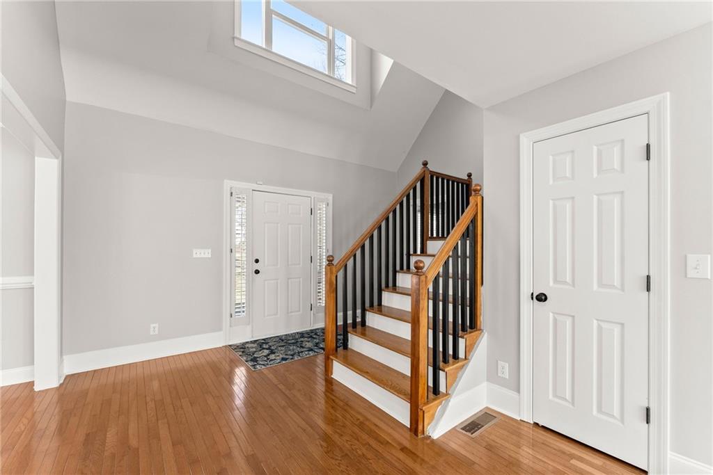 3523 Lighthouse Lane Gainesville, GA 30504 - Photo 10 of 72 a view of a hallway with entryway with wooden floor