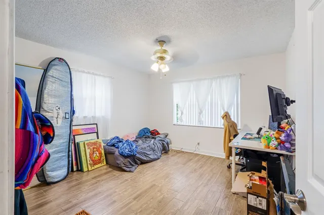 a view of a workspace with furniture and toys