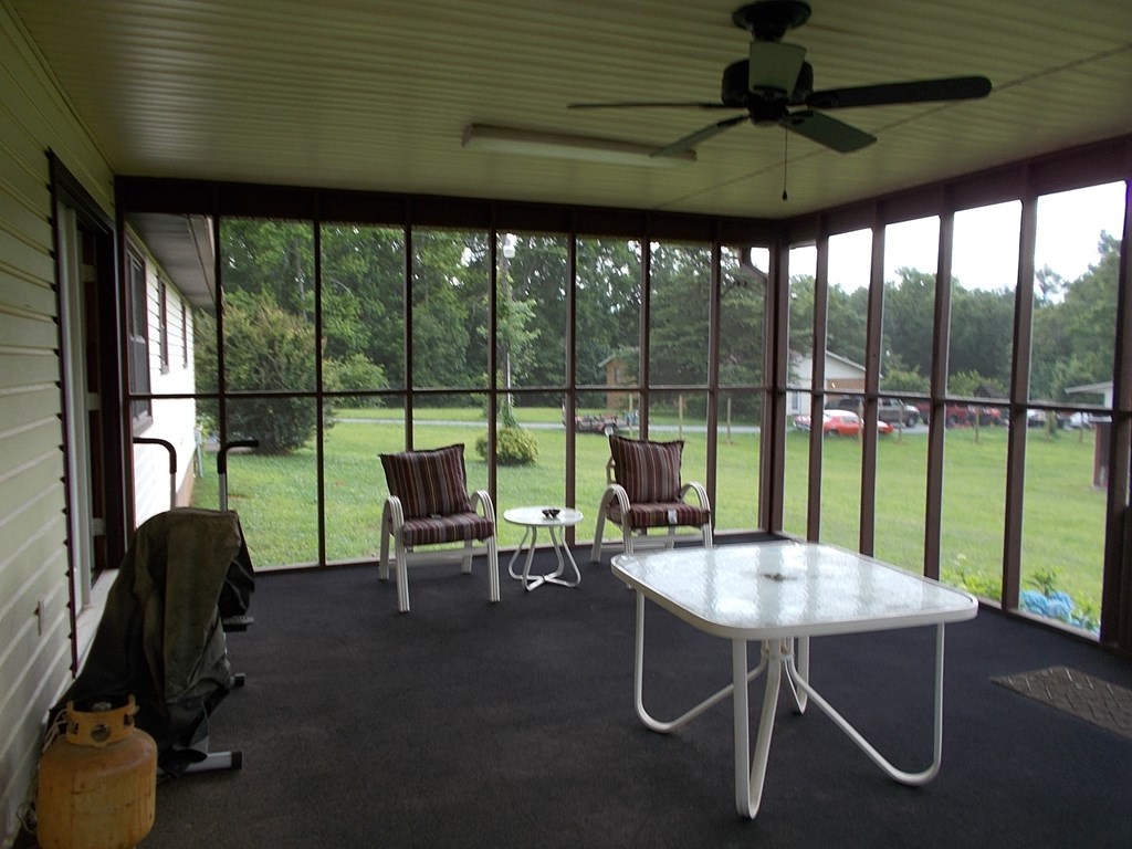 2972 Graham Road Gray, GA 31032 - Photo 14 of 29 a living room with furniture and a floor to ceiling window