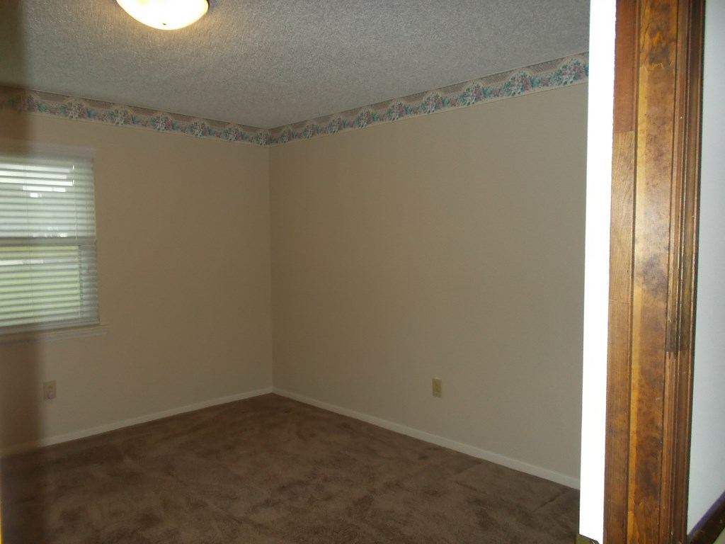 2972 Graham Road Gray, GA 31032 - Photo 22 of 29 a room that has a window in it
