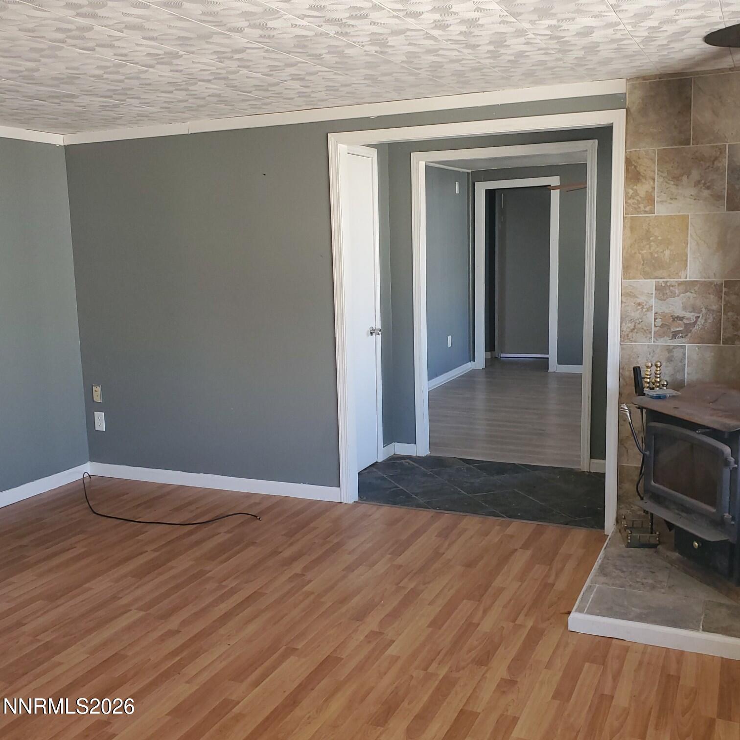 440 N Street Hawthorne, NV 89415 - Photo 15 of 34 a view of a livingroom with wooden floor and staircase