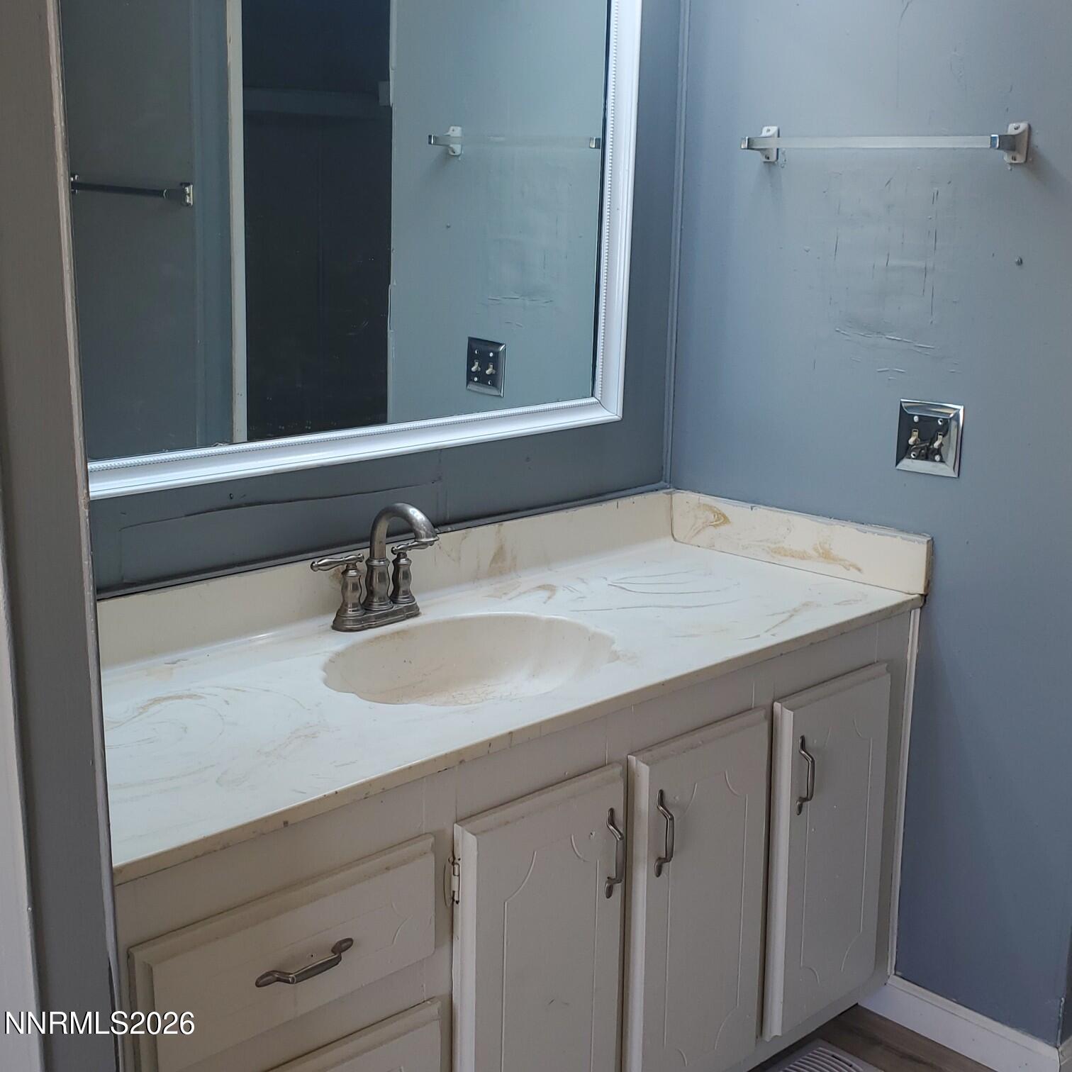 440 N Street Hawthorne, NV 89415 - Photo 19 of 34 a bathroom with a sink and a mirror