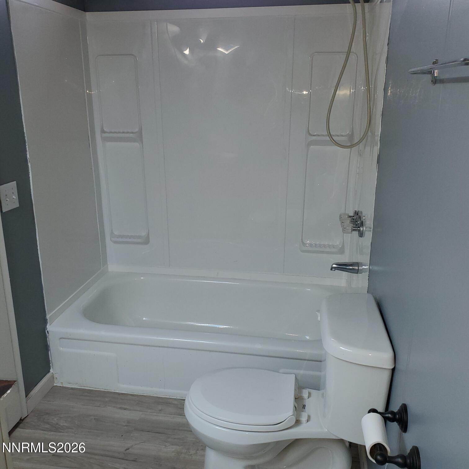 440 N Street Hawthorne, NV 89415 - Photo 27 of 34 a bathroom with a tub and a shower