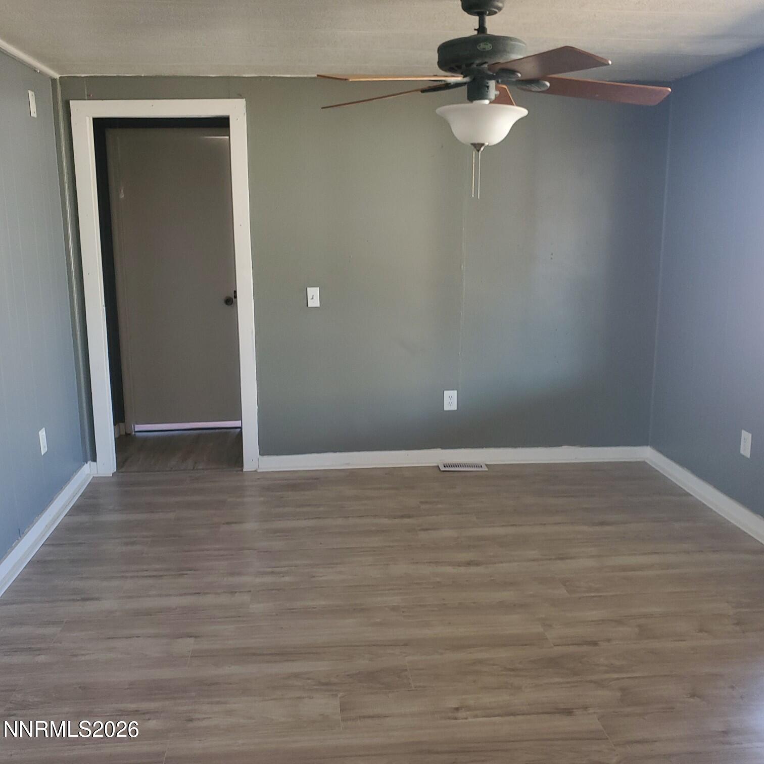 440 N Street Hawthorne, NV 89415 - Photo 30 of 34 wooden floor in an empty room
