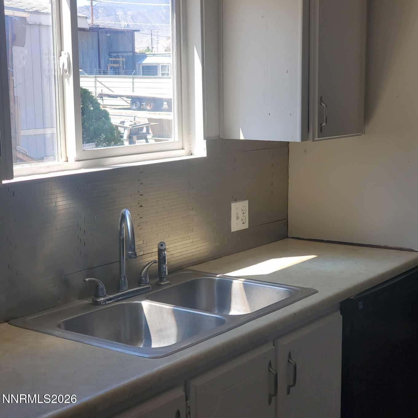 440 N Street Hawthorne, NV 89415 - Photo 10 of 34 a kitchen with a sink and a window