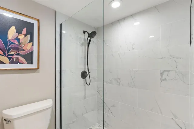 a close view of a shower in bathroom