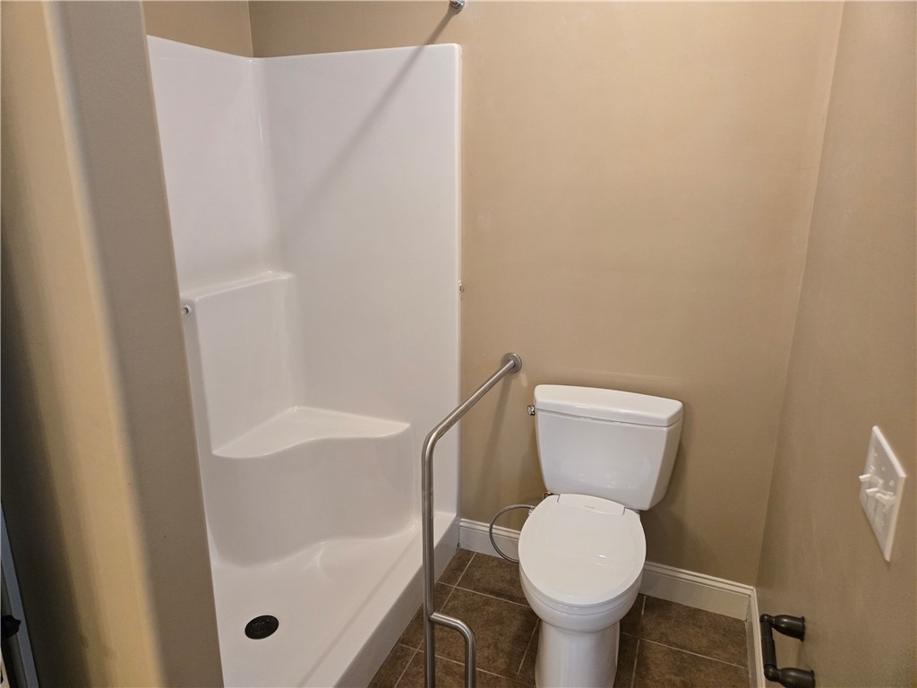 304 Knoll View Drive Seneca, SC 29678 - Photo 12 of 36 This functional bathroom provides essential amenities for comfortable living.