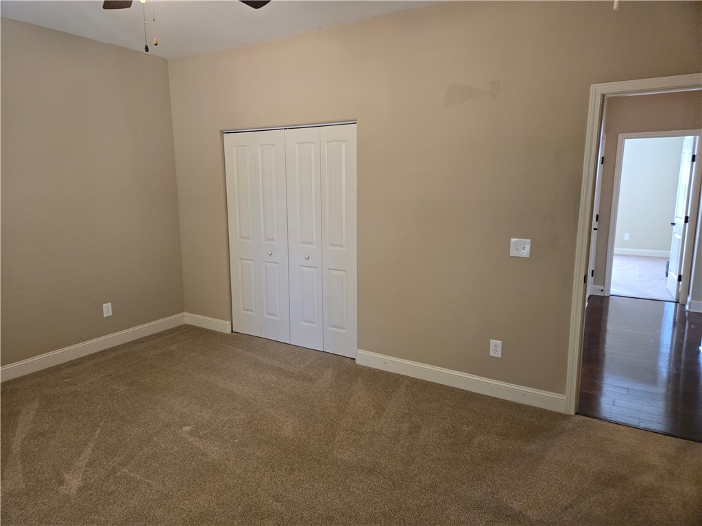 304 Knoll View Drive Seneca, SC 29678 - Photo 19 of 36 This cozy bedroom offers a comfortable retreat with ample closet space.