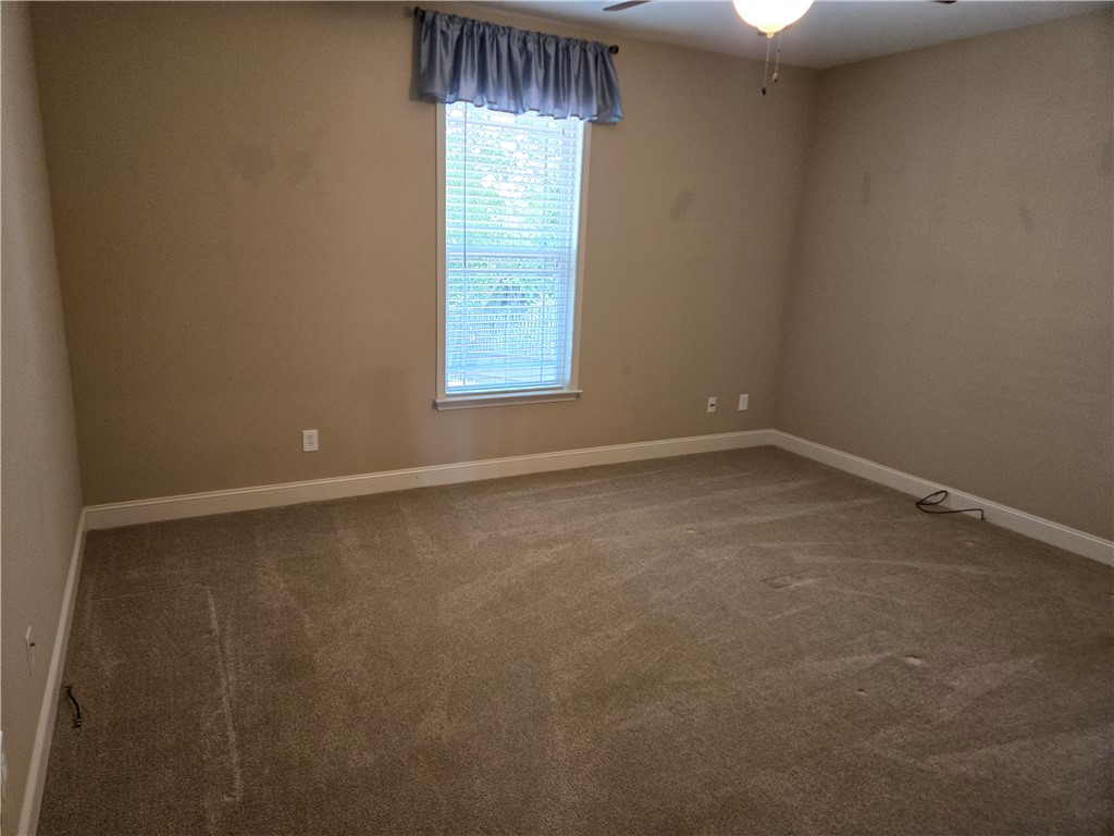 304 Knoll View Drive Seneca, SC 29678 - Photo 20 of 36 This spacious bedroom offers ample comfort and natural light.