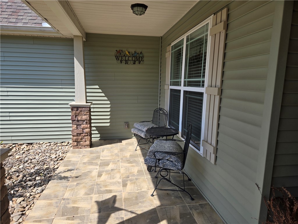 304 Knoll View Drive Seneca, SC 29678 - Photo 25 of 36 This inviting porch offers a tranquil spot for relaxation, complete with durable flooring and thoughtful design.