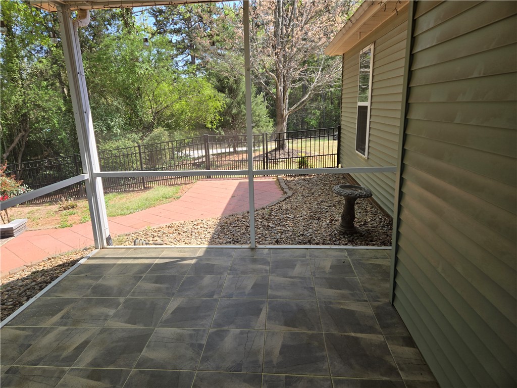 304 Knoll View Drive Seneca, SC 29678 - Photo 28 of 36 This inviting screened porch provides a peaceful retreat for outdoor living.