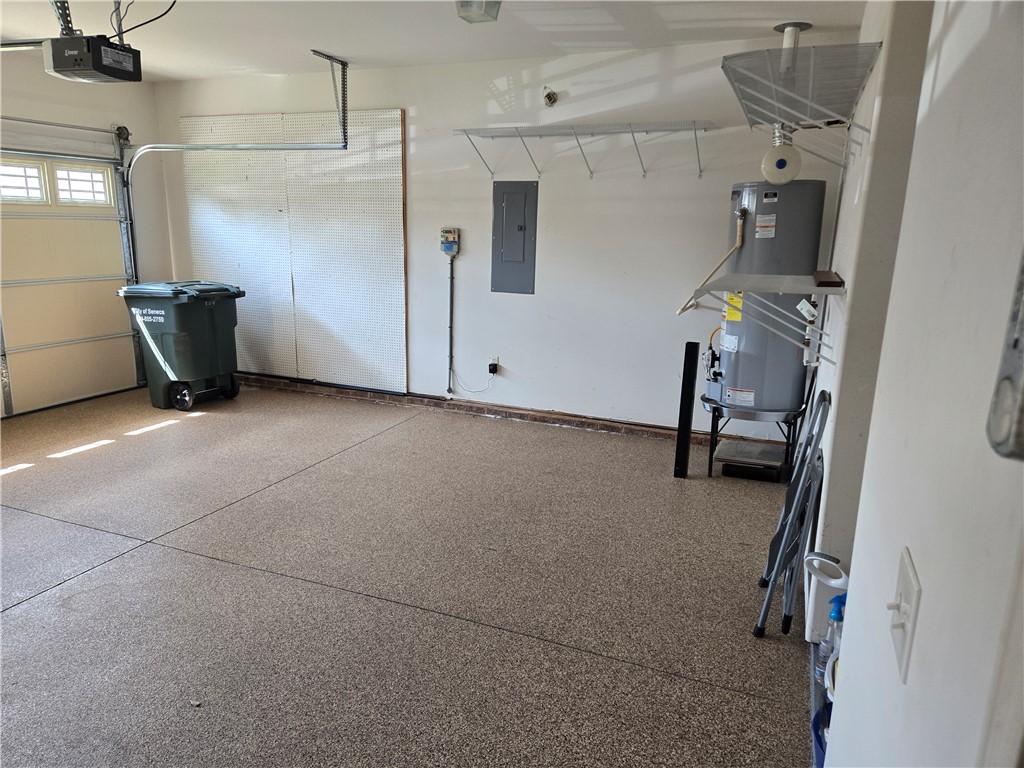 304 Knoll View Drive Seneca, SC 29678 - Photo 30 of 36 This spacious garage offers versatile storage options and convenient access.