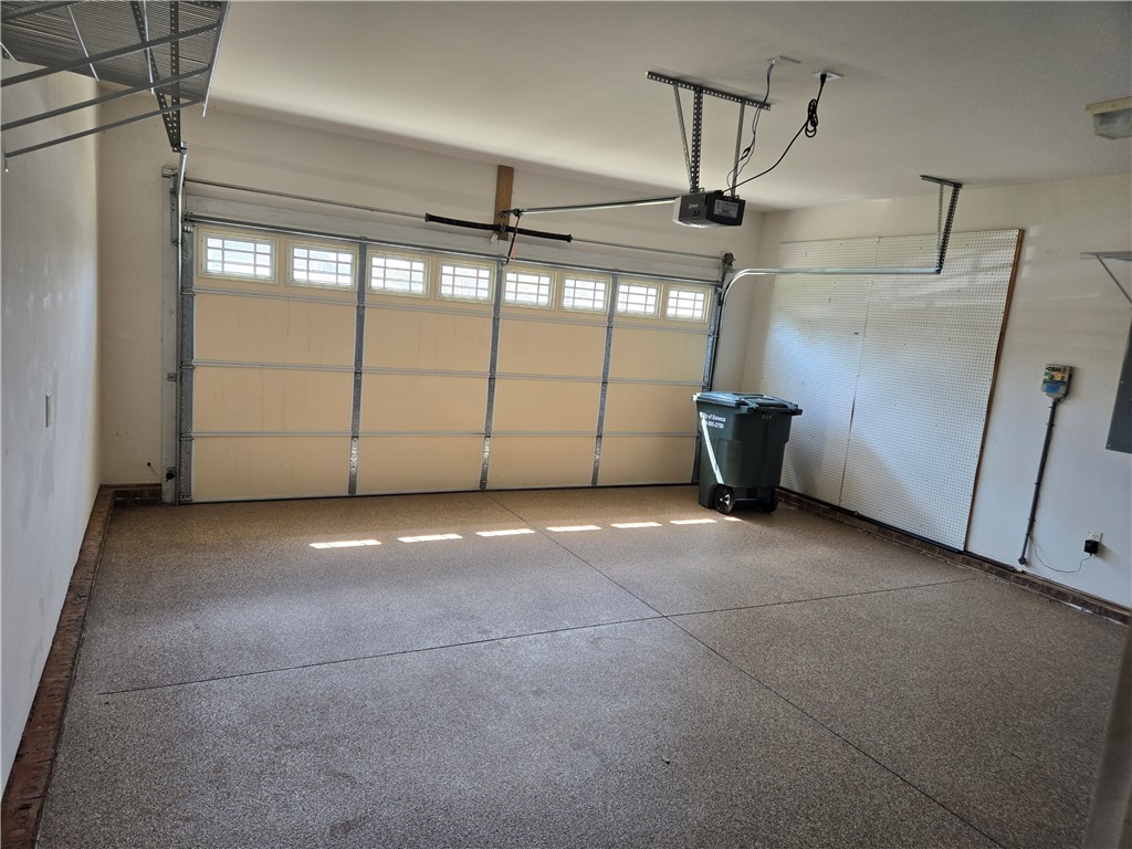 304 Knoll View Drive Seneca, SC 29678 - Photo 31 of 36 This spacious garage offers practical utility and ample storage solutions.