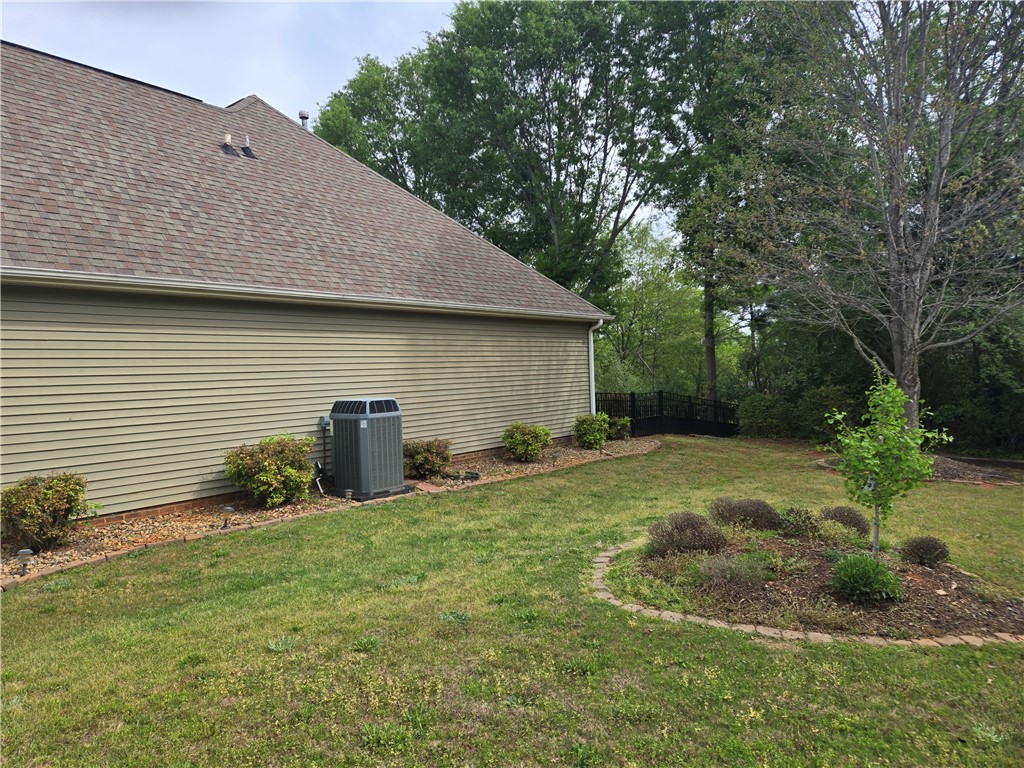 304 Knoll View Drive Seneca, SC 29678 - Photo 36 of 36 This verdant outdoor space provides a tranquil retreat with ample room for outdoor activities.