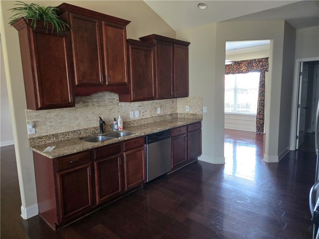 304 Knoll View Drive Seneca, SC 29678 - Photo 4 of 36 This functional kitchen features rich cabinetry, providing an inviting space for culinary endeavors.