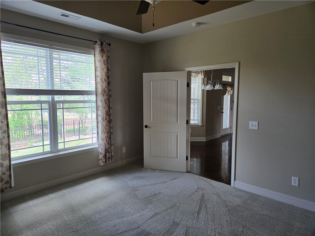 304 Knoll View Drive Seneca, SC 29678 - Photo 7 of 36 This tranquil bedroom offers comfort and natural light.