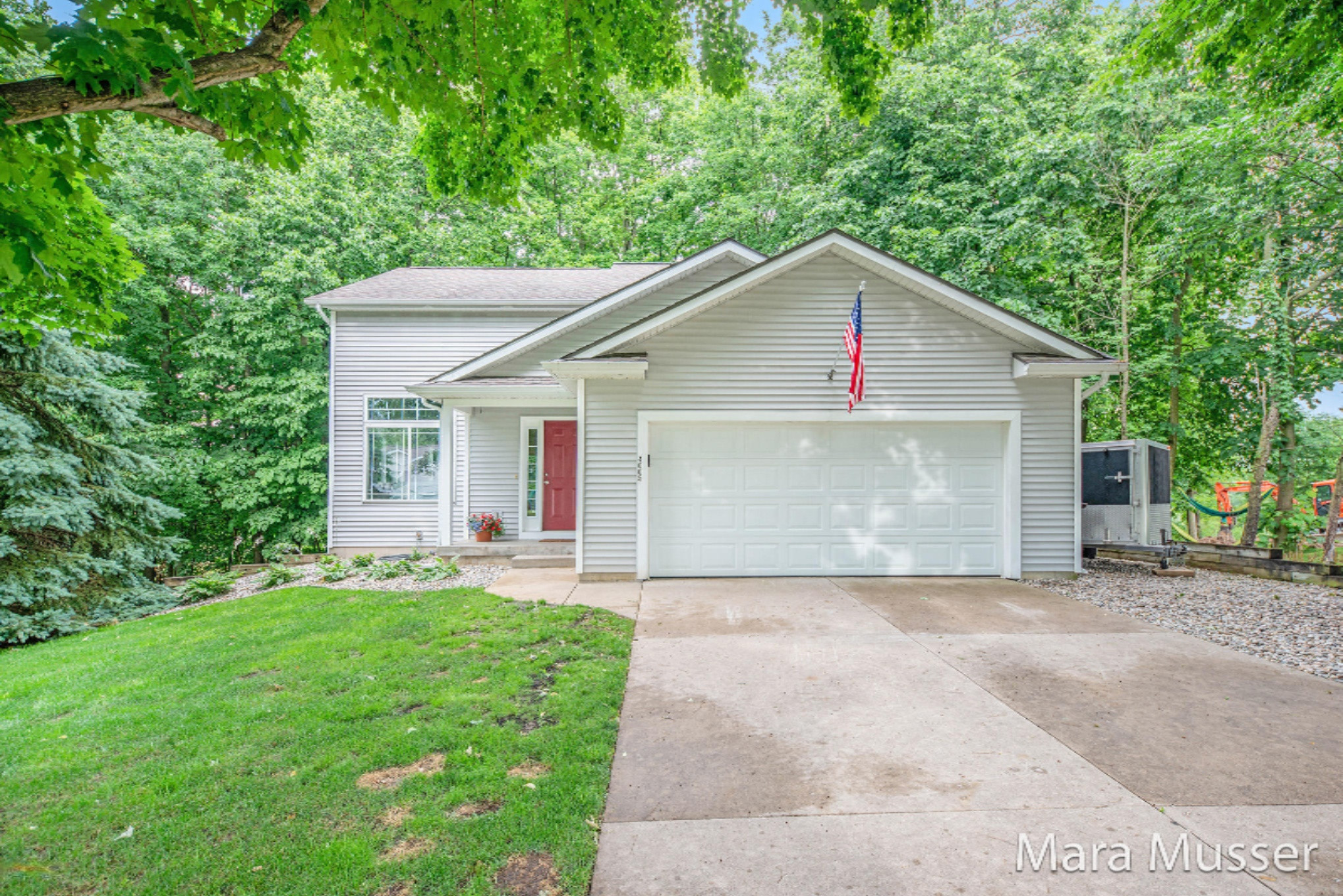 4005 Patti Road Dorr, MI 49323 - Photo 2 of 40 Front of home