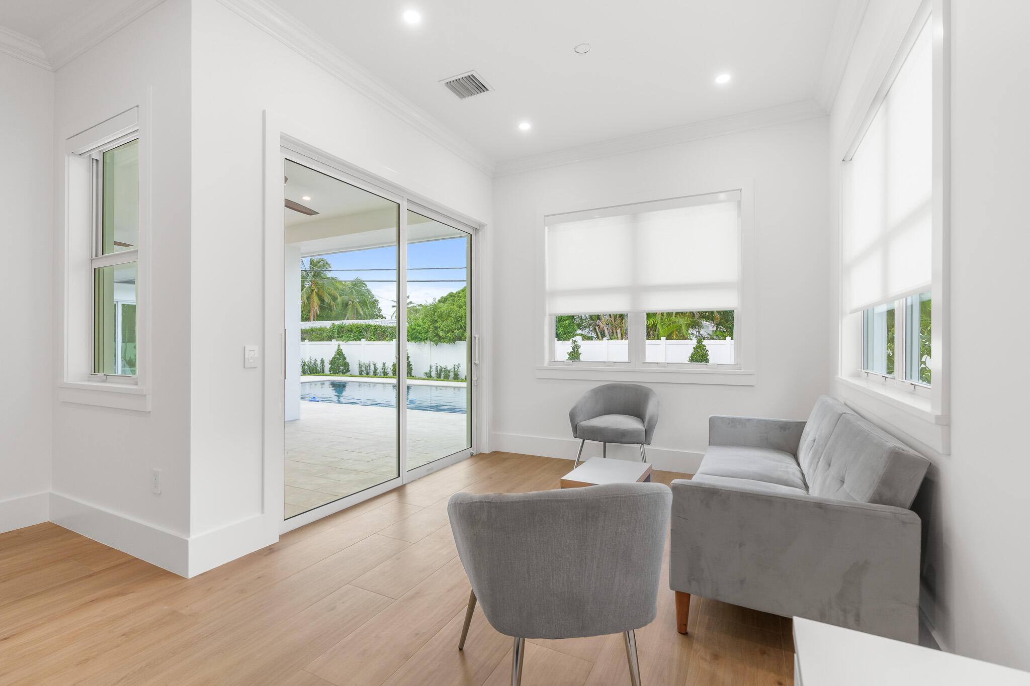 803 Sunset Road Boynton Beach, FL 33435 - Photo 26 of 57 a living room with furniture and a window