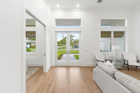 a living room with furniture and a gate