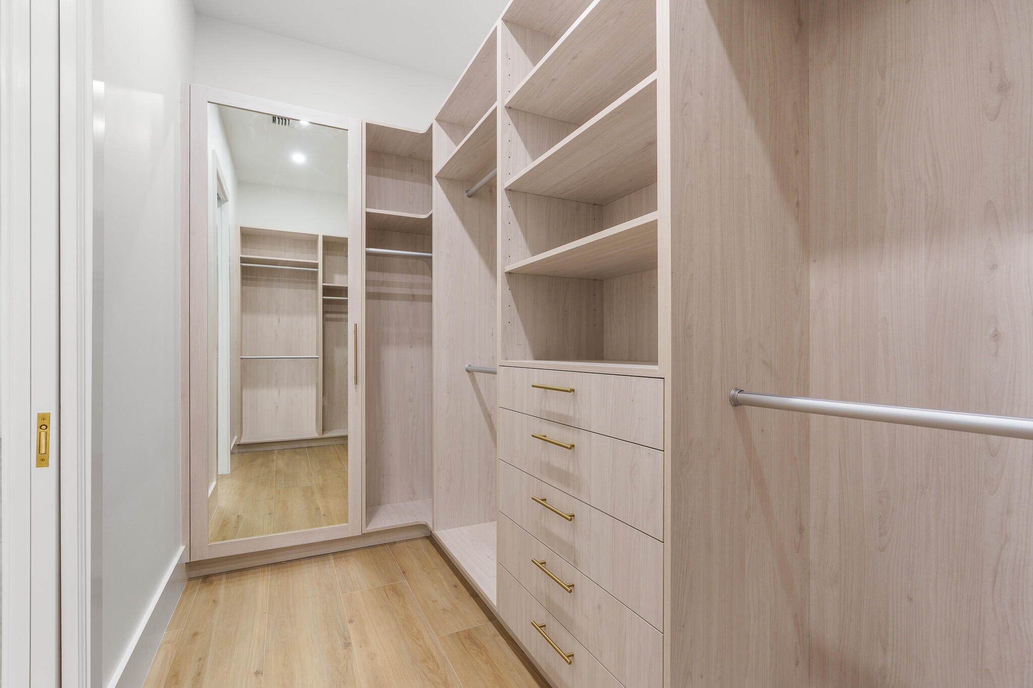 803 Sunset Road Boynton Beach, FL 33435 - Photo 32 of 57 a view of walk in closet with empty racks