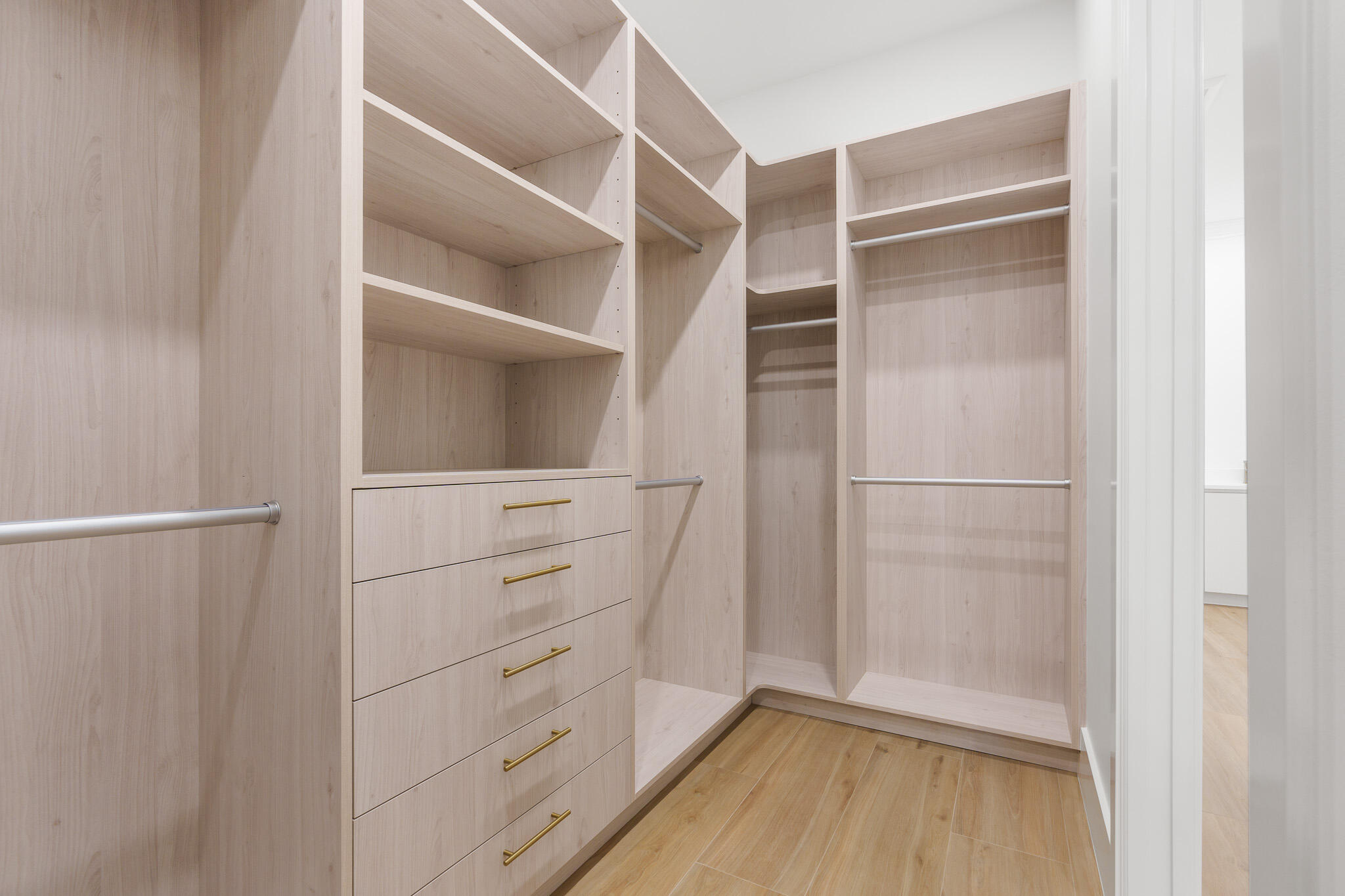 803 Sunset Road Boynton Beach, FL 33435 - Photo 33 of 57 a view of walk in closet with empty racks