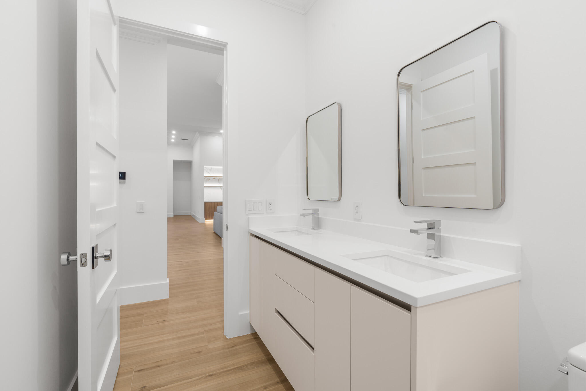 803 Sunset Road Boynton Beach, FL 33435 - Photo 45 of 57 a bathroom with 2 sink and a mirror