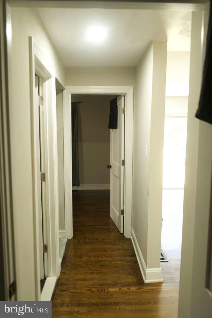 133 Heulings Avenue Riverside, NJ 08075 - Photo 12 of 31 a view of a hallway with wooden floor