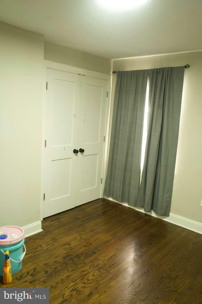 133 Heulings Avenue Riverside, NJ 08075 - Photo 13 of 31 a view of an empty room with wooden floor
